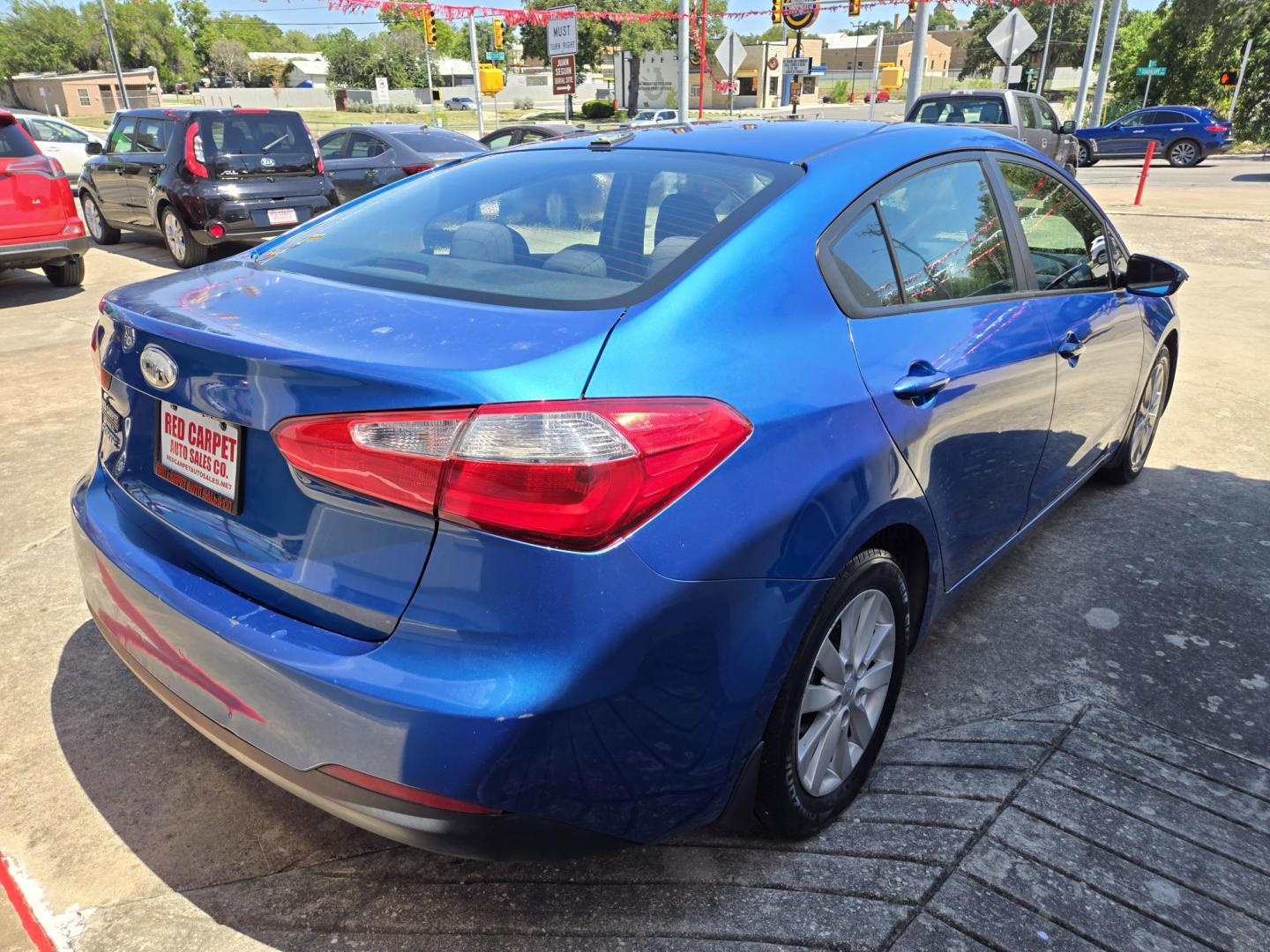 2014 Blue /Gray Kia Forte EX (KNAFX4A60E5) with an 1.8L L4 DOHC 16V engine, 6-Speed Automatic transmission, located at 503 West Court, Seguin, TX, 78155, (830) 379-3373, 29.568621, -97.969803 - Photo#3