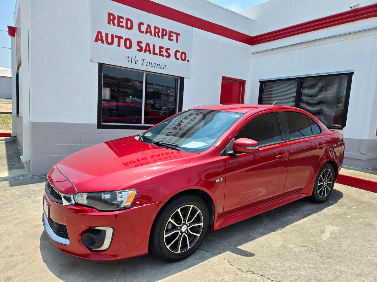 2017 Red /Black Mitsubishi Lancer ES 5M (JA32U2FU2HU) with an 2.0L L4 SOHC 16V engine, Automatic transmission, located at 503 West Court, Seguin, TX, 78155, (830) 379-3373, 29.568621, -97.969803 - Photo#0