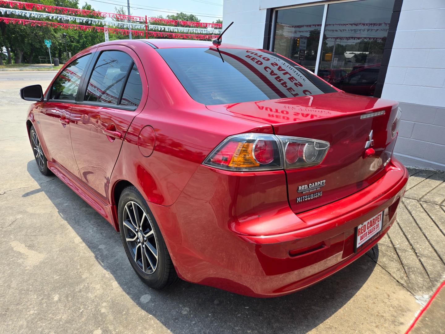 2017 Red /Black Mitsubishi Lancer ES 5M (JA32U2FU2HU) with an 2.0L L4 SOHC 16V engine, Automatic transmission, located at 503 West Court, Seguin, TX, 78155, (830) 379-3373, 29.568621, -97.969803 - Photo#3