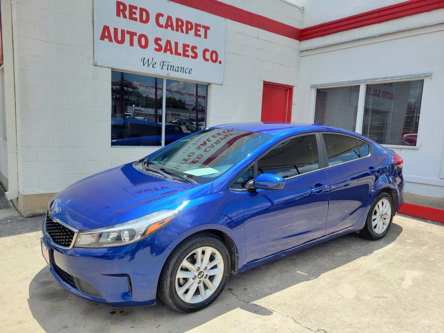 2017 Blue Kia Forte LX 6A (3KPFL4A74HE) with an 2.0L L4 DOHC 16V engine, 6A transmission, located at 503 West Court, Seguin, TX, 78155, (830) 379-3373, 29.568621, -97.969803 - Photo#0