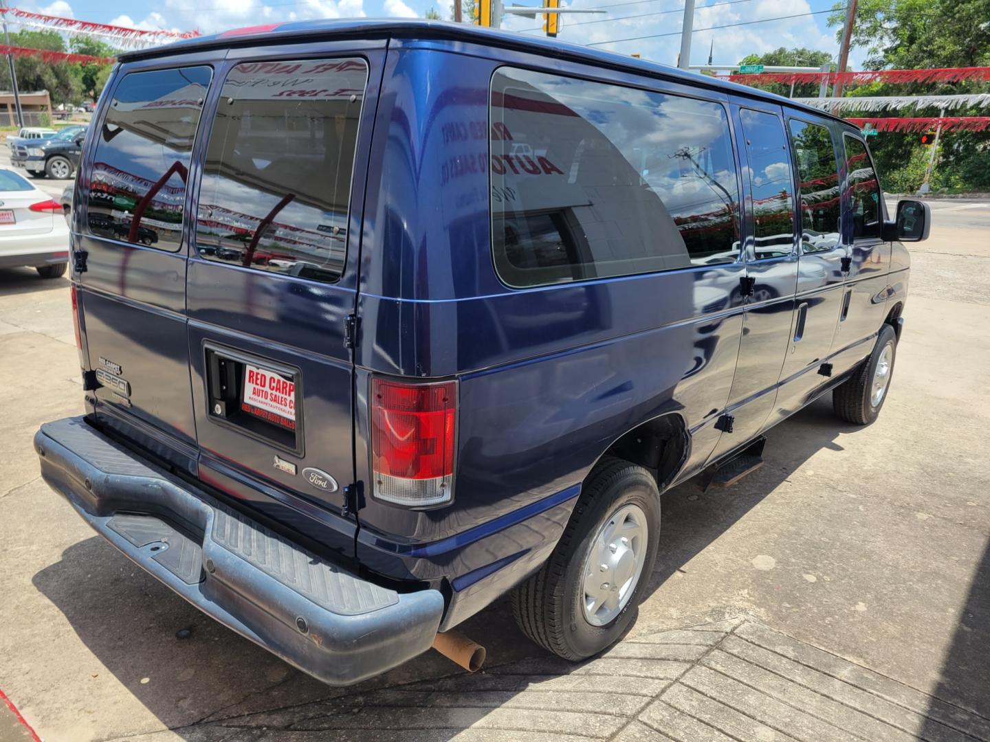 2012 Blue /BLACK Ford E-Series Wagon E-350 XL Super Duty (1FBNE3BL8CD) with an 5.4L V8 SOHC 16V FFV engine, Automatic transmission, located at 503 West Court, Seguin, TX, 78155, (830) 379-3373, 29.568621, -97.969803 - 2012 Ford E-Series Wagon E-350 XLT Super Duty 12 Passenger with a 5.4L V8 SOHC 16V FFV, Automatic, Tilt, AM/FM/AUX Stereo, Power Windows and Locks, Rear A/C, 12 Passenger Seating, Tinted Windows, and more!! - Photo#2