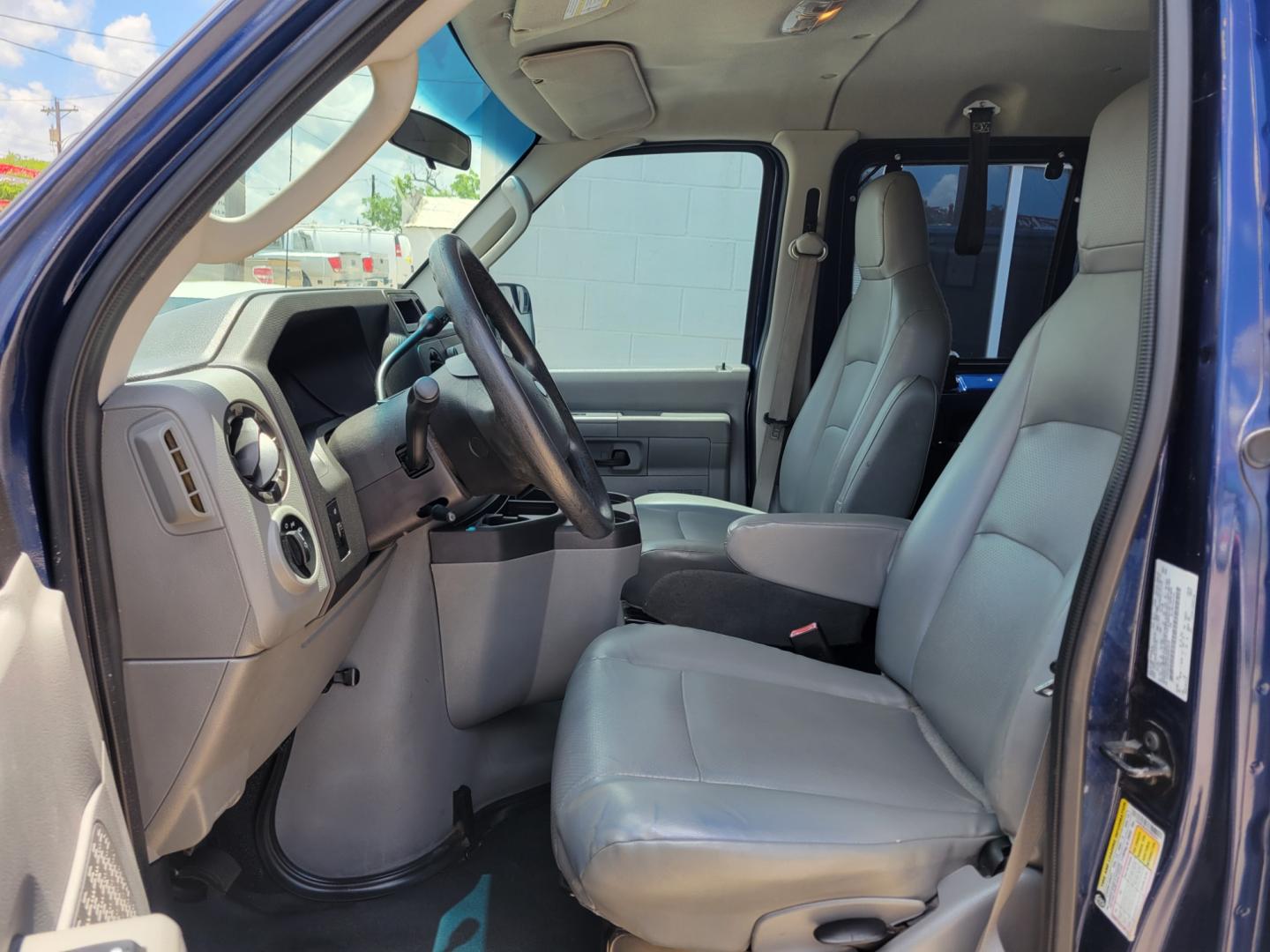 2012 Blue /BLACK Ford E-Series Wagon E-350 XL Super Duty (1FBNE3BL8CD) with an 5.4L V8 SOHC 16V FFV engine, Automatic transmission, located at 503 West Court, Seguin, TX, 78155, (830) 379-3373, 29.568621, -97.969803 - 2012 Ford E-Series Wagon E-350 XLT Super Duty 12 Passenger with a 5.4L V8 SOHC 16V FFV, Automatic, Tilt, AM/FM/AUX Stereo, Power Windows and Locks, Rear A/C, 12 Passenger Seating, Tinted Windows, and more!! - Photo#4