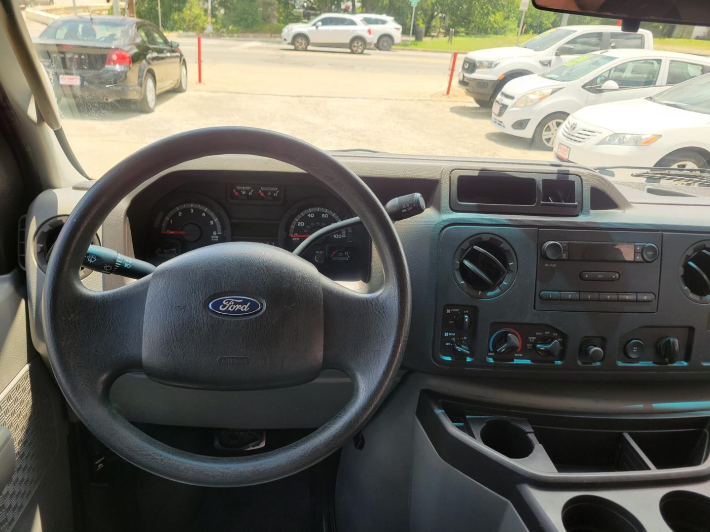 2012 Blue /BLACK Ford E-Series Wagon E-350 XL Super Duty (1FBNE3BL8CD) with an 5.4L V8 SOHC 16V FFV engine, Automatic transmission, located at 503 West Court, Seguin, TX, 78155, (830) 379-3373, 29.568621, -97.969803 - 2012 Ford E-Series Wagon E-350 XLT Super Duty 12 Passenger with a 5.4L V8 SOHC 16V FFV, Automatic, Tilt, AM/FM/AUX Stereo, Power Windows and Locks, Rear A/C, 12 Passenger Seating, Tinted Windows, and more!! - Photo#5