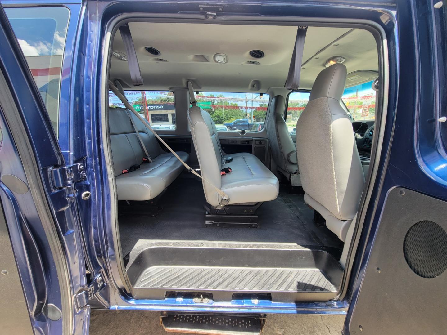 2012 Blue /BLACK Ford E-Series Wagon E-350 XL Super Duty (1FBNE3BL8CD) with an 5.4L V8 SOHC 16V FFV engine, Automatic transmission, located at 503 West Court, Seguin, TX, 78155, (830) 379-3373, 29.568621, -97.969803 - 2012 Ford E-Series Wagon E-350 XLT Super Duty 12 Passenger with a 5.4L V8 SOHC 16V FFV, Automatic, Tilt, AM/FM/AUX Stereo, Power Windows and Locks, Rear A/C, 12 Passenger Seating, Tinted Windows, and more!! - Photo#6