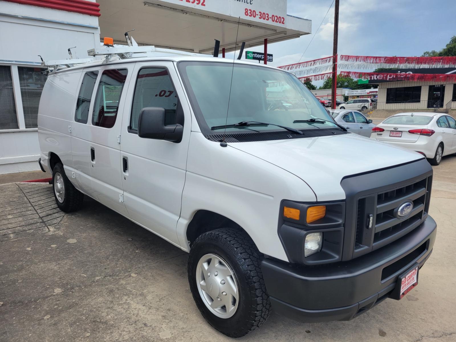 2014 WHITE /GRAY Ford E-Series Van E-150 (1FTNE1EWXED) with an 4.6L V8 SOHC 16V engine, 4-Speed Automatic transmission, located at 503 West Court, Seguin, TX, 78155, (830) 379-3373, 29.568621, -97.969803 - 2014 Ford E-Series Van E-150 with a 4.6L V8 SOHC 16V, Automatic, Tilt, AM/FM/AUX Stereo, Power Windows and Locks, Rear Shelving, Ladder Rack, Strobe Light and More!! - Photo #1