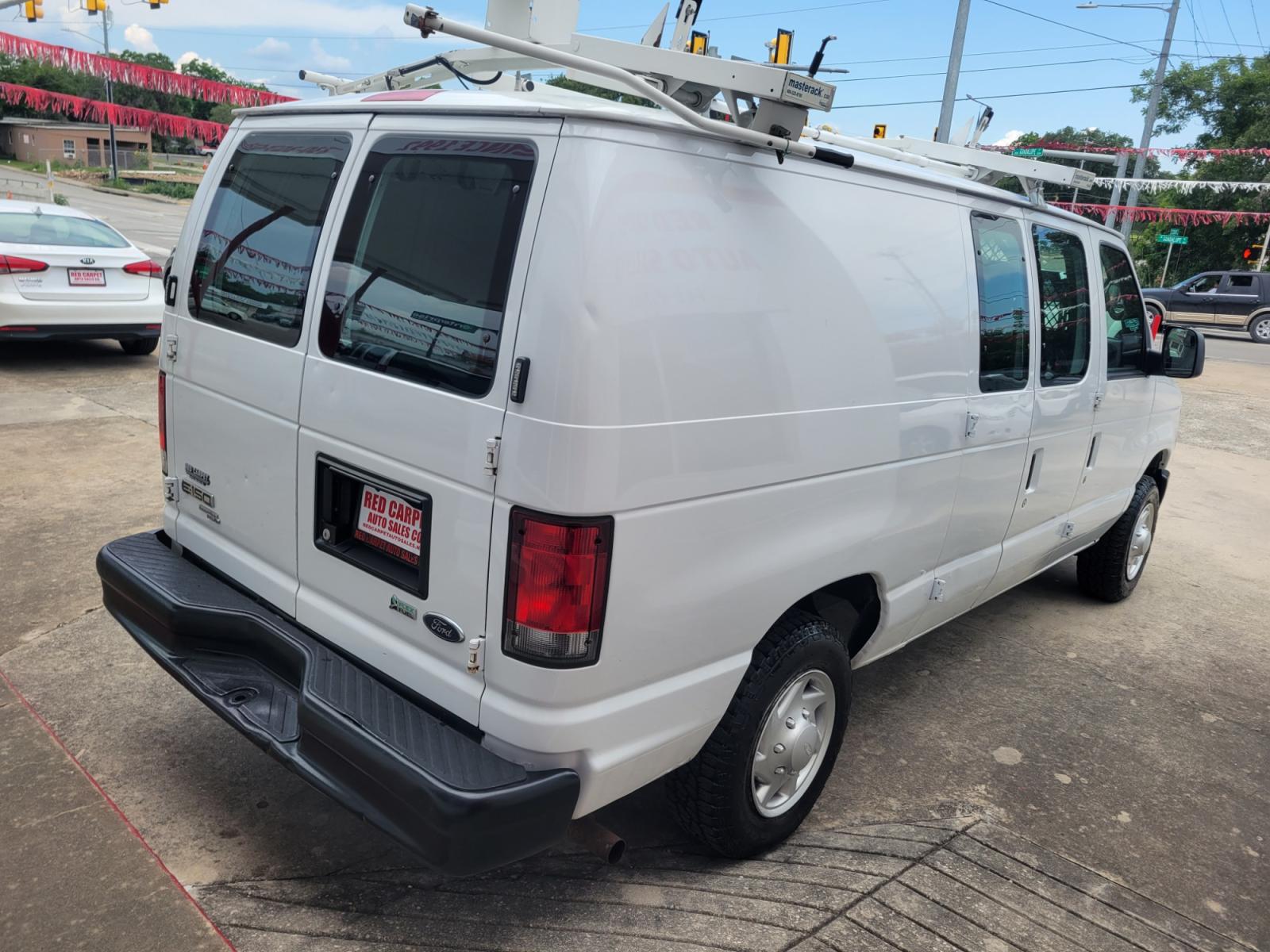 2014 WHITE /GRAY Ford E-Series Van E-150 (1FTNE1EWXED) with an 4.6L V8 SOHC 16V engine, 4-Speed Automatic transmission, located at 503 West Court, Seguin, TX, 78155, (830) 379-3373, 29.568621, -97.969803 - 2014 Ford E-Series Van E-150 with a 4.6L V8 SOHC 16V, Automatic, Tilt, AM/FM/AUX Stereo, Power Windows and Locks, Rear Shelving, Ladder Rack, Strobe Light and More!! - Photo #2