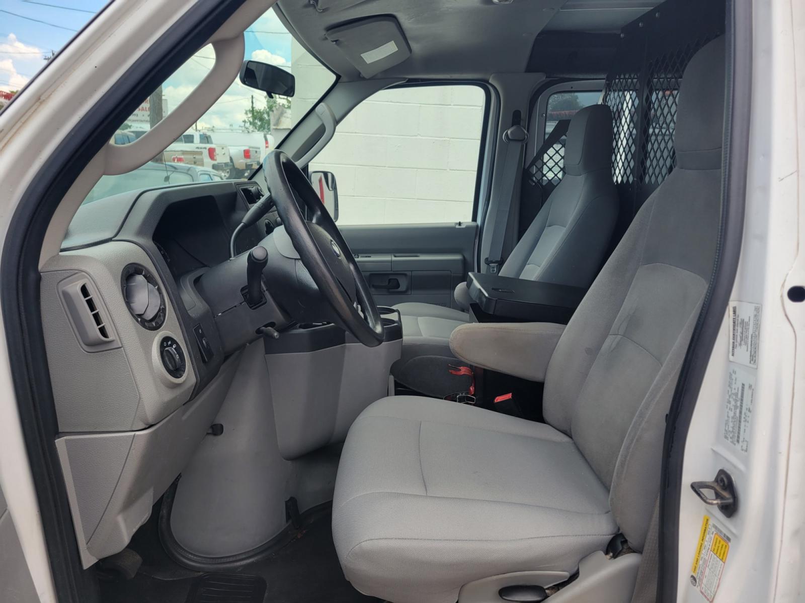 2014 WHITE /GRAY Ford E-Series Van E-150 (1FTNE1EWXED) with an 4.6L V8 SOHC 16V engine, 4-Speed Automatic transmission, located at 503 West Court, Seguin, TX, 78155, (830) 379-3373, 29.568621, -97.969803 - 2014 Ford E-Series Van E-150 with a 4.6L V8 SOHC 16V, Automatic, Tilt, AM/FM/AUX Stereo, Power Windows and Locks, Rear Shelving, Ladder Rack, Strobe Light and More!! - Photo #4