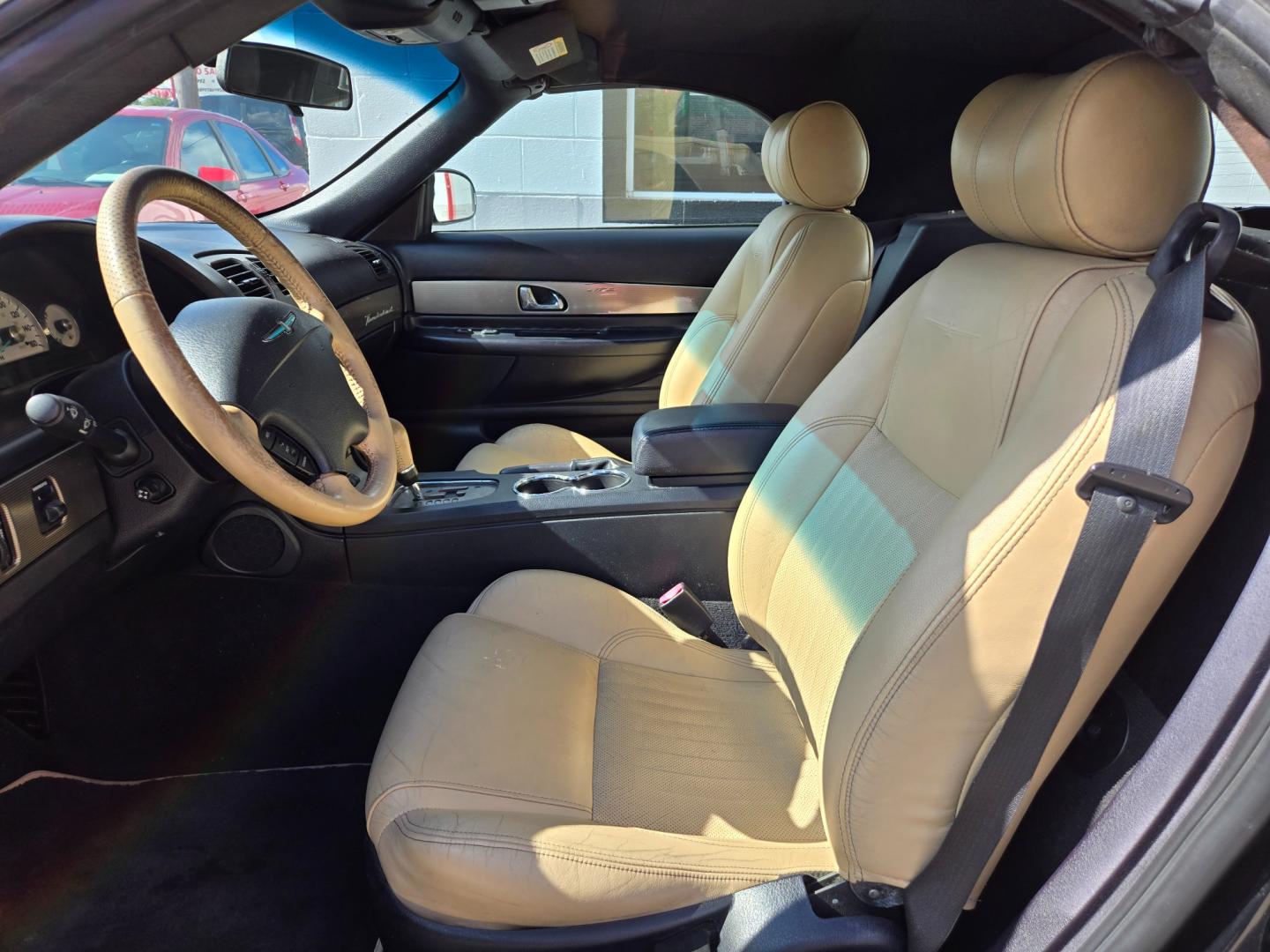 2004 Black /BEIGE Ford Thunderbird Deluxe (1FAHP60A14Y) with an 3.9L V8 DOHC 32V engine, 5-Speed Automatic Overdrive transmission, located at 503 West Court, Seguin, TX, 78155, (830) 379-3373, 29.568621, -97.969803 - Photo#4