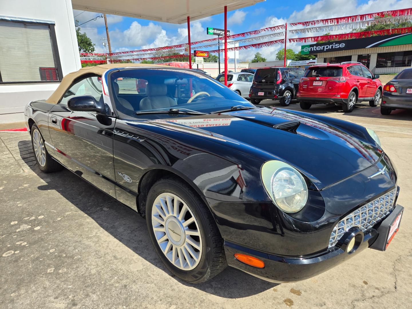 2004 Black /BEIGE Ford Thunderbird Deluxe (1FAHP60A14Y) with an 3.9L V8 DOHC 32V engine, 5-Speed Automatic Overdrive transmission, located at 503 West Court, Seguin, TX, 78155, (830) 379-3373, 29.568621, -97.969803 - Photo#1