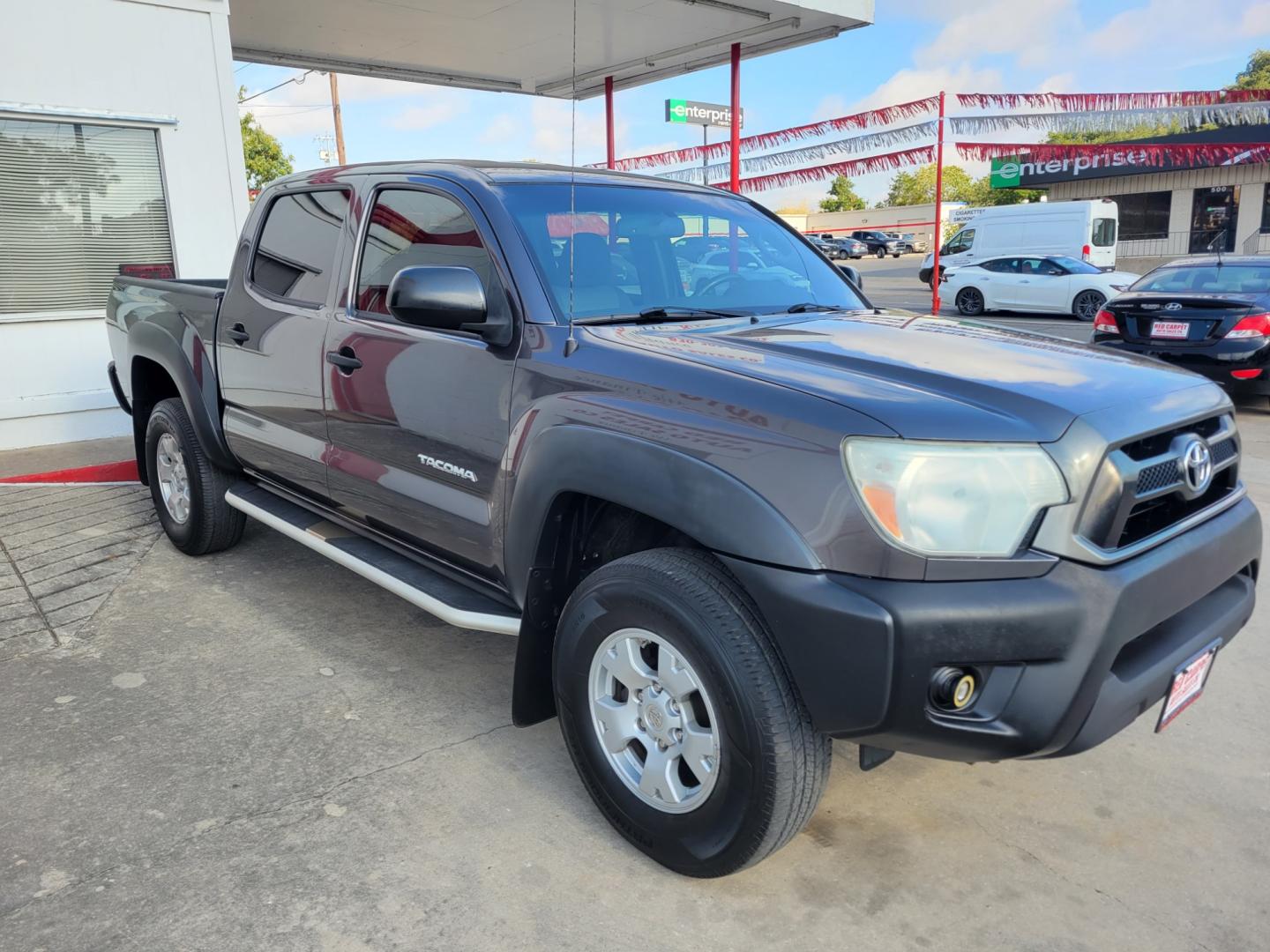 2015 GRAY /BLACK Toyota Tacoma PreRunner Double Cab I4 4AT 2WD (5TFJX4GN1FX) with an 2.7L L4 DOHC 16V engine, 4-Speed Automatic transmission, located at 503 West Court, Seguin, TX, 78155, (830) 379-3373, 29.568621, -97.969803 - 2015 Toyota Tacoma PreRunner Double Cab 2WD with a 2.7L L4 DOHC 16V, Automatic, Tilt, Cruise, AM/FM/CD/AUX Touchscreen Stereo, Power Windows, Locks and Side Mirrors, Bluetooth, Tinted Windows, Running Boards, Alloy Wheels and more!! - Photo#1