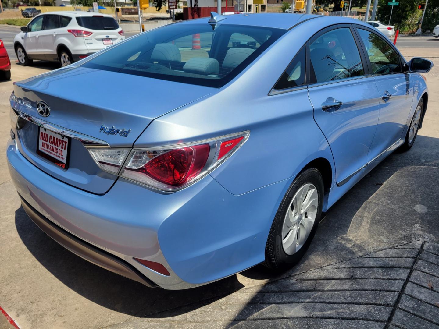 2015 Blue /BLACK Hyundai Sonata Hybrid Sedan (KMHEC4A41FA) with an 2.4L L4 DOHC 16V HYBRID engine, 6-Speed Automatic transmission, located at 503 West Court, Seguin, TX, 78155, (830) 379-3373, 29.568621, -97.969803 - 2015 Hyundai Sonata Hybrid Sedan with a 2.4L L4 DOHC 16V HYBRID, Automatic, Tilt, Cruise, AM/FM/CD/AUX Stereo, Power Windows, Locks and Side Mirrors, Bluetooth, Dual Climate Control, Heated Seats, Backup Camera, Alloy Wheels, Rear Defroster and more!! - Photo#2