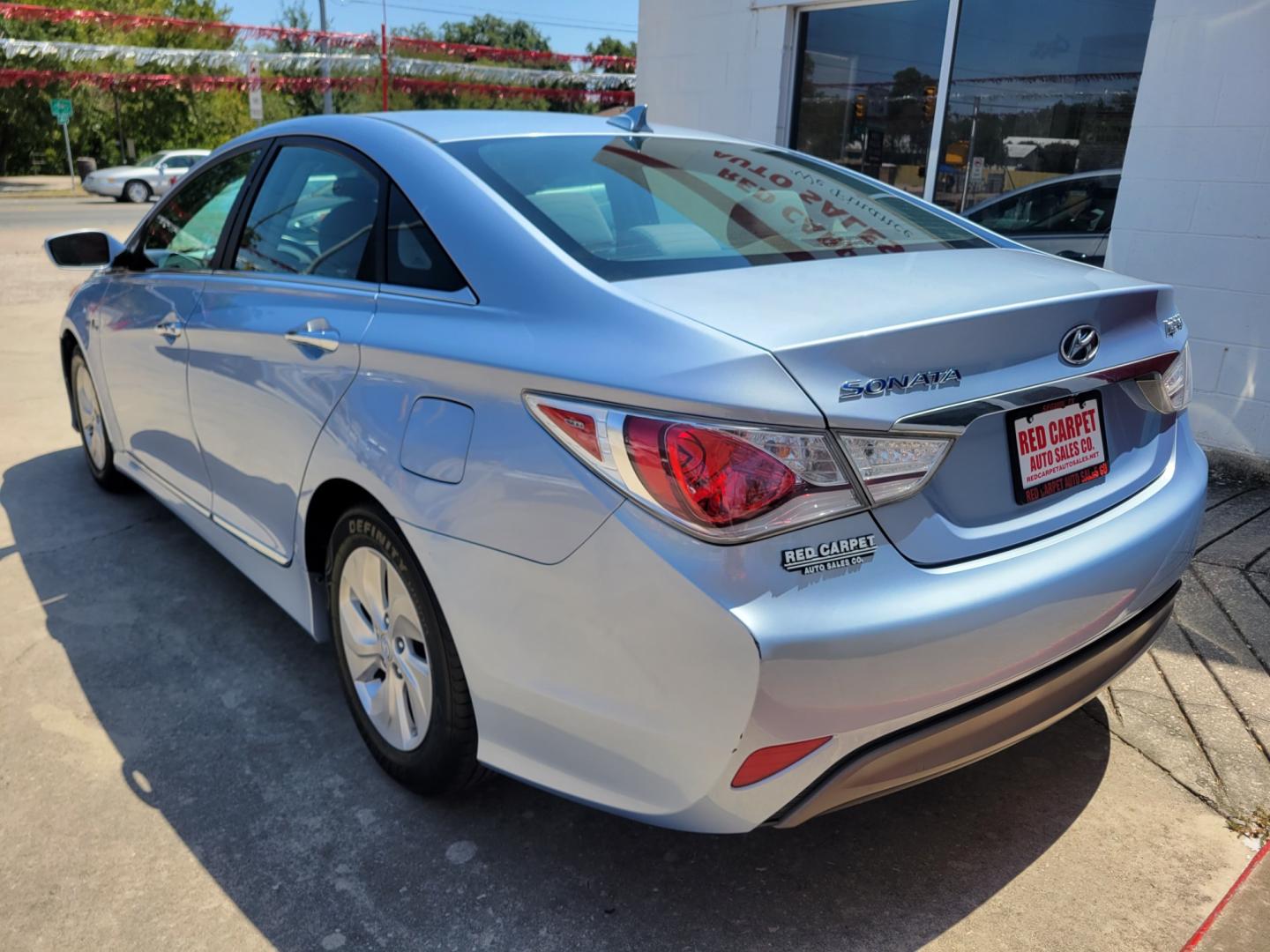 2015 Blue /BLACK Hyundai Sonata Hybrid Sedan (KMHEC4A41FA) with an 2.4L L4 DOHC 16V HYBRID engine, 6-Speed Automatic transmission, located at 503 West Court, Seguin, TX, 78155, (830) 379-3373, 29.568621, -97.969803 - 2015 Hyundai Sonata Hybrid Sedan with a 2.4L L4 DOHC 16V HYBRID, Automatic, Tilt, Cruise, AM/FM/CD/AUX Stereo, Power Windows, Locks and Side Mirrors, Bluetooth, Dual Climate Control, Heated Seats, Backup Camera, Alloy Wheels, Rear Defroster and more!! - Photo#3