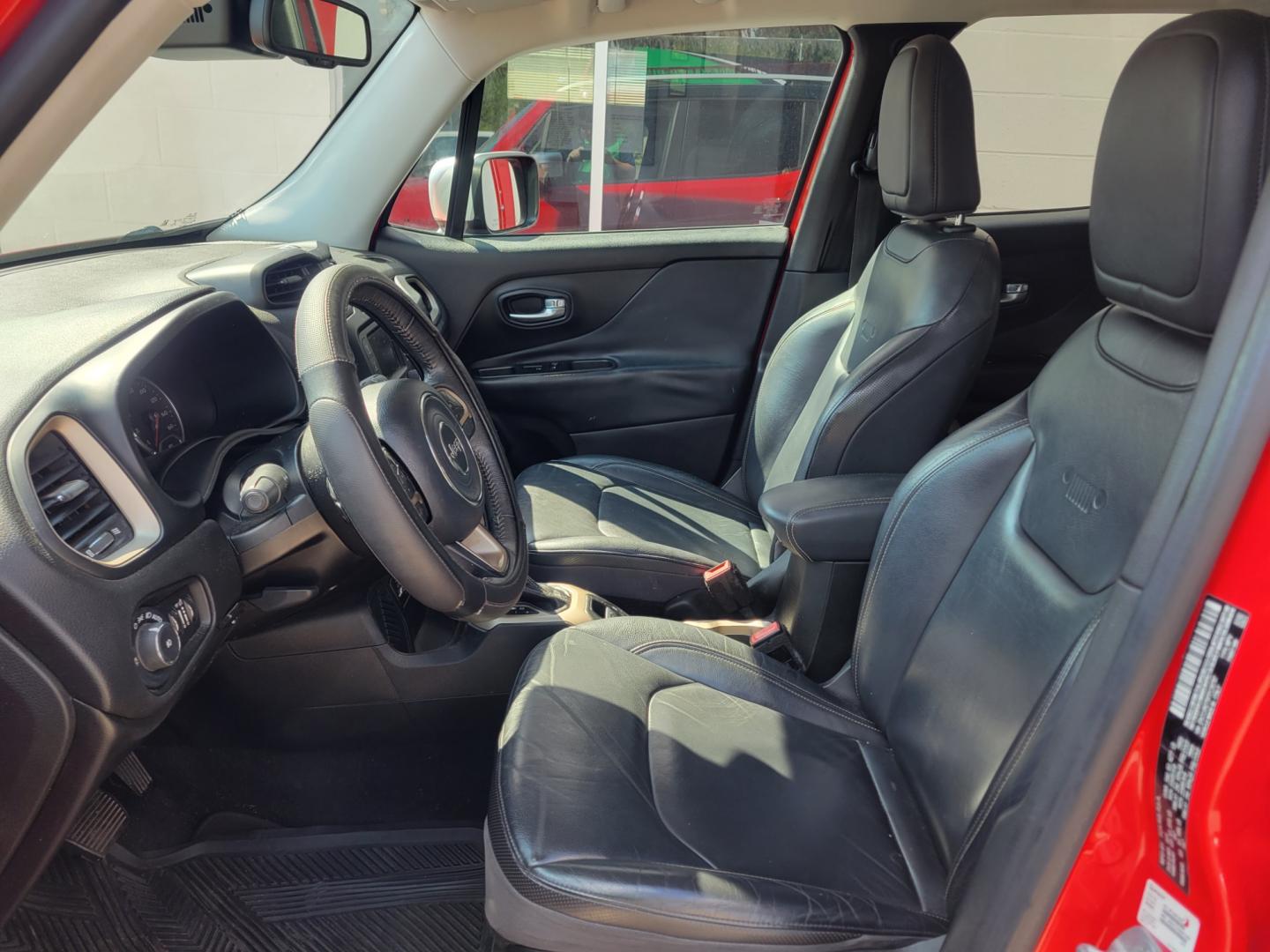 2015 Red /BLACK Jeep Renegade Limited FWD (ZACCJADT6FP) with an 2.4L L4 engine, 9-Speed Automatic transmission, located at 503 West Court, Seguin, TX, 78155, (830) 379-3373, 29.568621, -97.969803 - 2015 Jeep Renegade Limited FWD with a 2.4L L4, Automatic, Tilt, Cruise, AM/FM Touchscreen Stereo, Power Windows, Locks, Seat and Side Mirrors, Bluetooth, Leather Seats, Heated Seats, Heated Steering Wheel, Dual Climate Control, Alloy Wheels, Rear Wiper, Rear Defroster and more!! - Photo#4