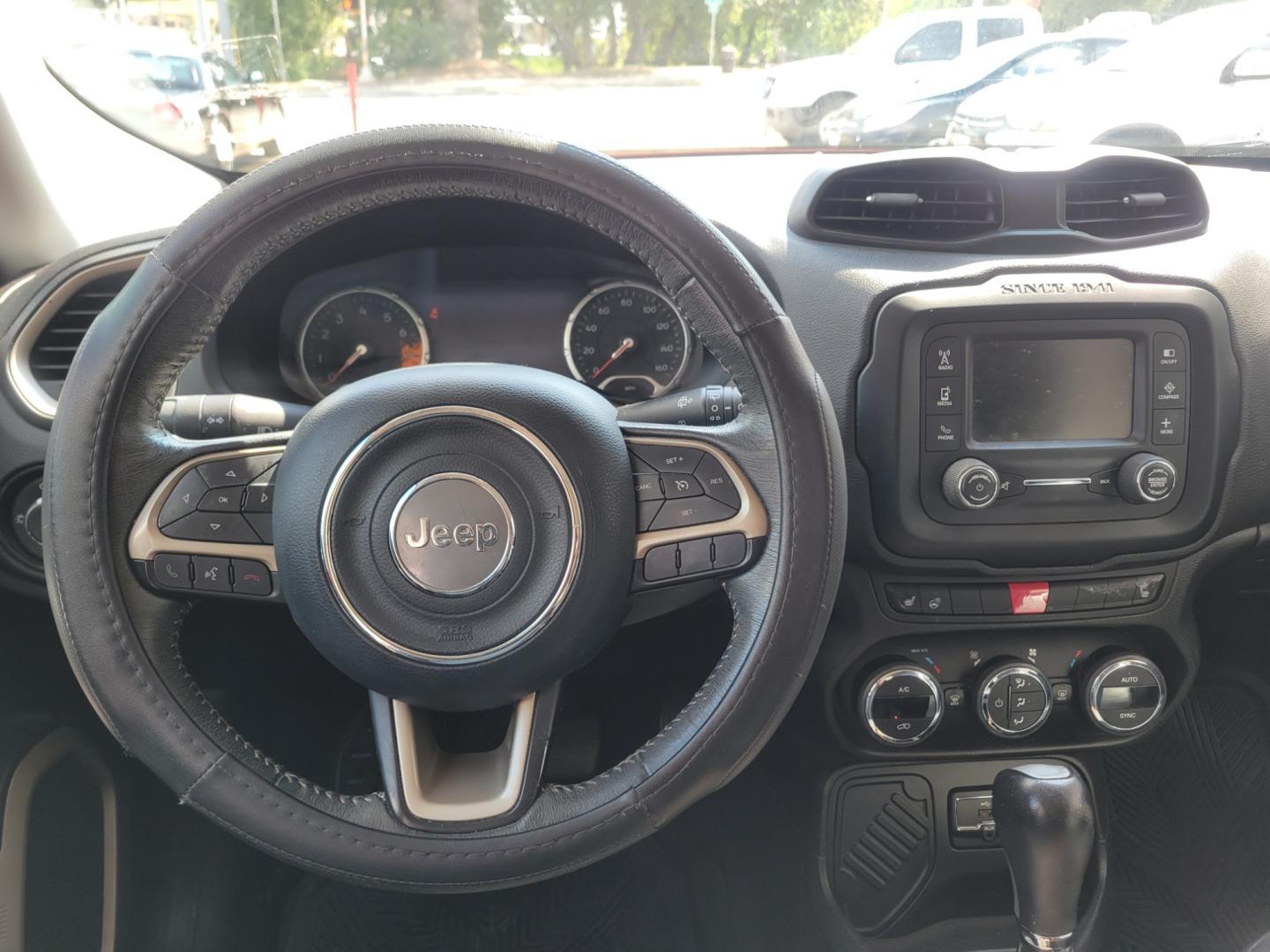 2015 Red /BLACK Jeep Renegade Limited FWD (ZACCJADT6FP) with an 2.4L L4 engine, 9-Speed Automatic transmission, located at 503 West Court, Seguin, TX, 78155, (830) 379-3373, 29.568621, -97.969803 - 2015 Jeep Renegade Limited FWD with a 2.4L L4, Automatic, Tilt, Cruise, AM/FM Touchscreen Stereo, Power Windows, Locks, Seat and Side Mirrors, Bluetooth, Leather Seats, Heated Seats, Heated Steering Wheel, Dual Climate Control, Alloy Wheels, Rear Wiper, Rear Defroster and more!! - Photo#5