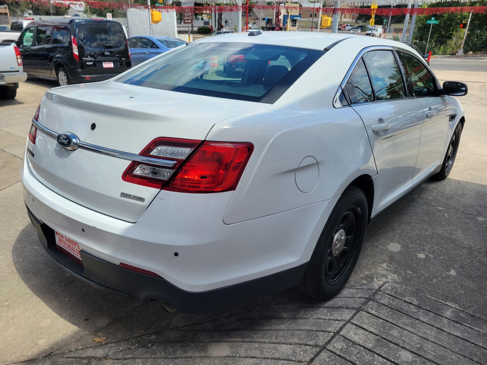 2017 WHITE /BLACK Ford Taurus Police FWD (1FAHP2L81HG) with an 3.5L V6 DOHC 24V engine, 6A transmission, located at 503 West Court, Seguin, TX, 78155, (830) 379-3373, 29.568621, -97.969803 - Photo #2