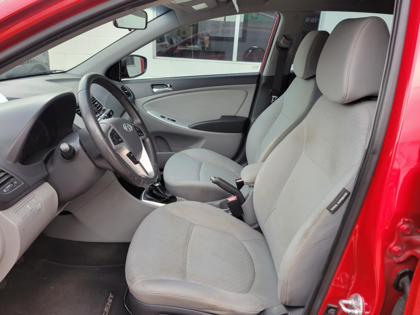 2012 Red /GRAY Hyundai Accent GS 5-Door (KMHCU5AE5CU) with an 1.6L L4 DOHC 16V engine, Manual Transmission transmission, located at 503 West Court, Seguin, TX, 78155, (830) 379-3373, 29.568621, -97.969803 - Photo#4