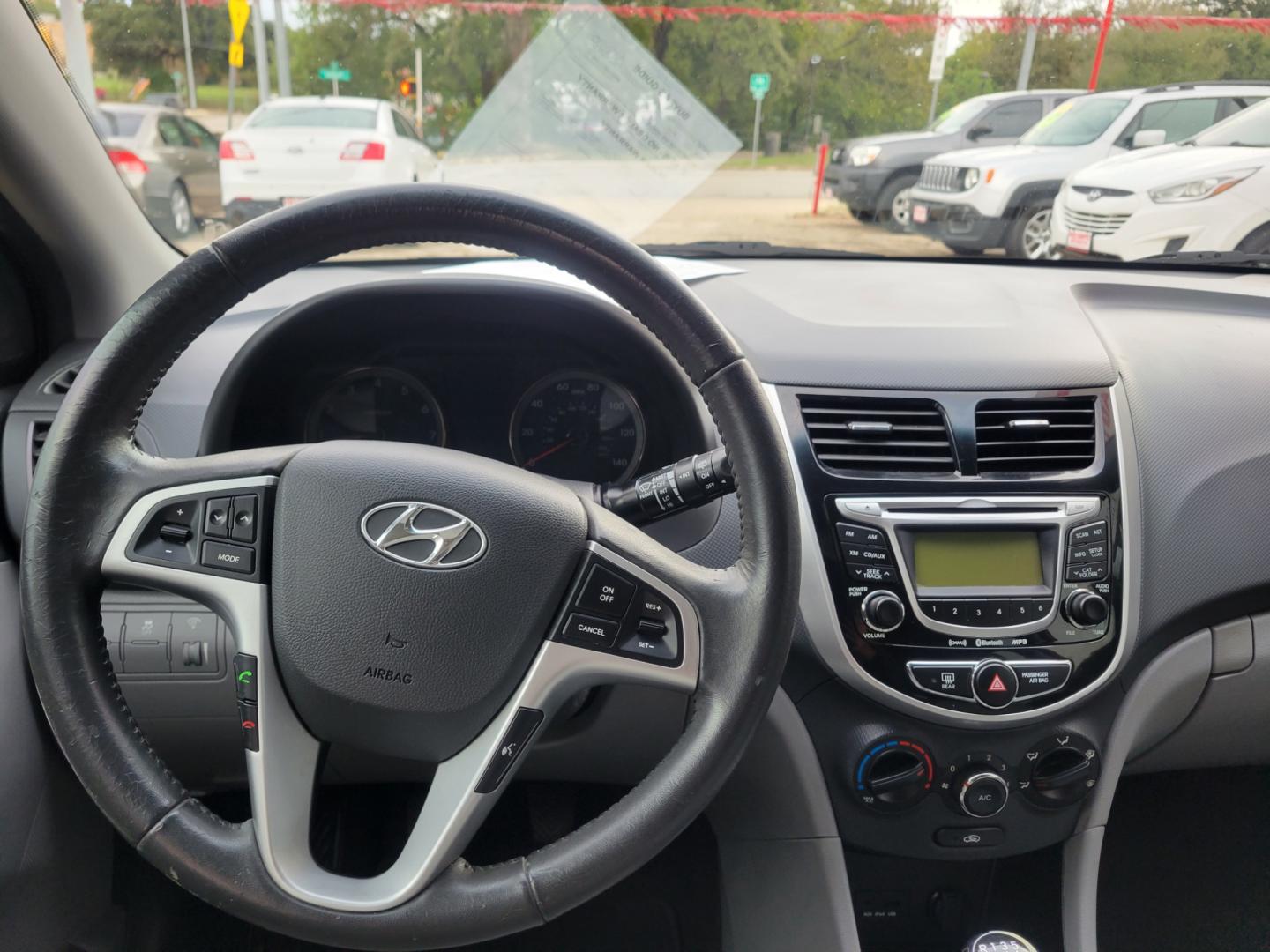 2012 Red /GRAY Hyundai Accent GS 5-Door (KMHCU5AE5CU) with an 1.6L L4 DOHC 16V engine, Manual Transmission transmission, located at 503 West Court, Seguin, TX, 78155, (830) 379-3373, 29.568621, -97.969803 - Photo#5