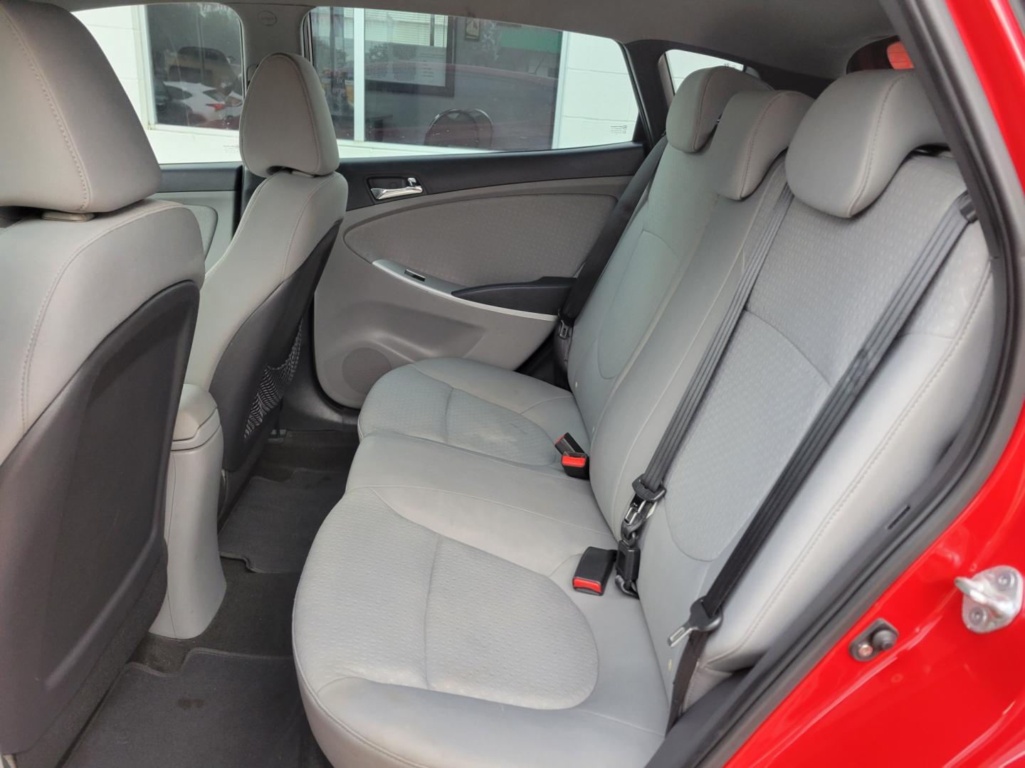 2012 Red /GRAY Hyundai Accent GS 5-Door (KMHCU5AE5CU) with an 1.6L L4 DOHC 16V engine, Manual Transmission transmission, located at 503 West Court, Seguin, TX, 78155, (830) 379-3373, 29.568621, -97.969803 - Photo#6