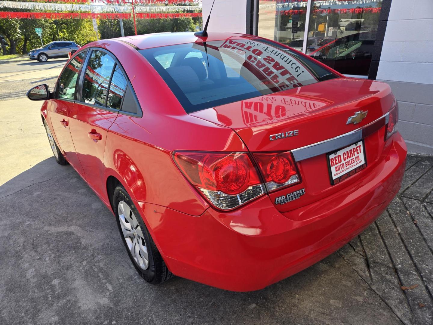 2014 Red Chevrolet Cruze LS Auto (1G1PA5SH8E7) with an 1.8L L4 DOHC 16V FFV engine, 6-Speed Automatic transmission, located at 503 West Court, Seguin, TX, 78155, (830) 379-3373, 29.568621, -97.969803 - Photo#3