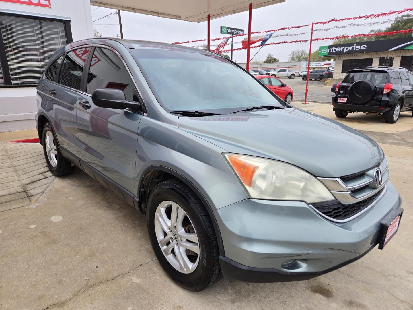 2011 Green Honda CR-V (5J6RE3H55BL) with an 2.4L I4 F DOHC 16V engine, Automatic transmission, located at 503 West Court, Seguin, TX, 78155, (830) 379-3373, 29.568621, -97.969803 - Photo#1