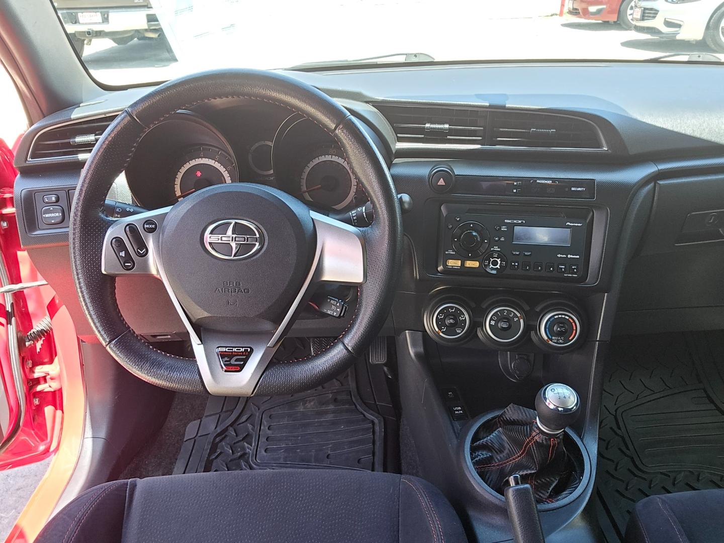 2013 Red Scion tC Sports Coupe 6-Spd AT (JTKJF5C74D3) with an 2.4L L4 DOHC 16V engine, Manual Transmission transmission, located at 503 West Court, Seguin, TX, 78155, (830) 379-3373, 29.568621, -97.969803 - Photo#5