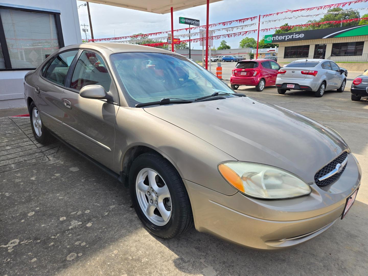 2002 PEWTER Ford Taurus (1FAFP53U72G) with an 3.0L V6 F OHV engine, Automatic transmission, located at 503 West Court, Seguin, TX, 78155, (830) 379-3373, 29.568621, -97.969803 - Photo#1