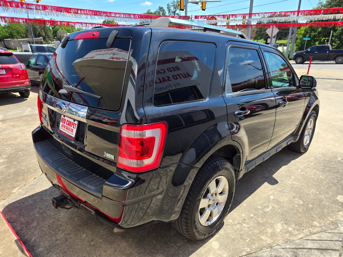 2012 Black Ford Escape (1FMCU0EG0CK) with an 3.0L V6 F DOHC 24V engine, Automatic transmission, located at 503 West Court, Seguin, TX, 78155, (830) 379-3373, 29.568621, -97.969803 - Photo#2