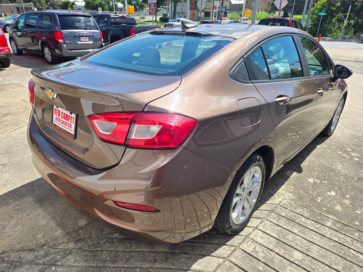 2019 PEWTER Chevrolet Cruze (1G1BC5SM7K7) with an 1.4L I4 F DOHC 16V engine, Automatic transmission, located at 503 West Court, Seguin, TX, 78155, (830) 379-3373, 29.568621, -97.969803 - 2019 Chevrolet Cruze LS with a 1.4L I4 F DOHC 16V, Automatic, Tilt, Cruise, AM/FM Touchscreen Stereo, Power Windows, Locks and Side Mirrors, Bluetooth, Apple Car Play, Automatic Headlights, Alloy Wheels, Backup Camera, Rear Defroster and more!! - Photo#2