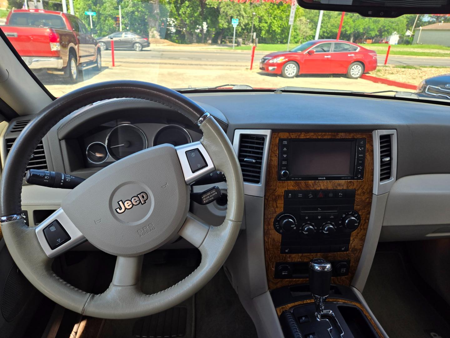 2010 Red Jeep Grand Cherokee Limited 4WD (1J4RR5GT9AC) with an 5.7L V8 OHV 16V engine, 5-Speed Automatic transmission, located at 503 West Court, Seguin, TX, 78155, (830) 379-3373, 29.568621, -97.969803 - Photo#5