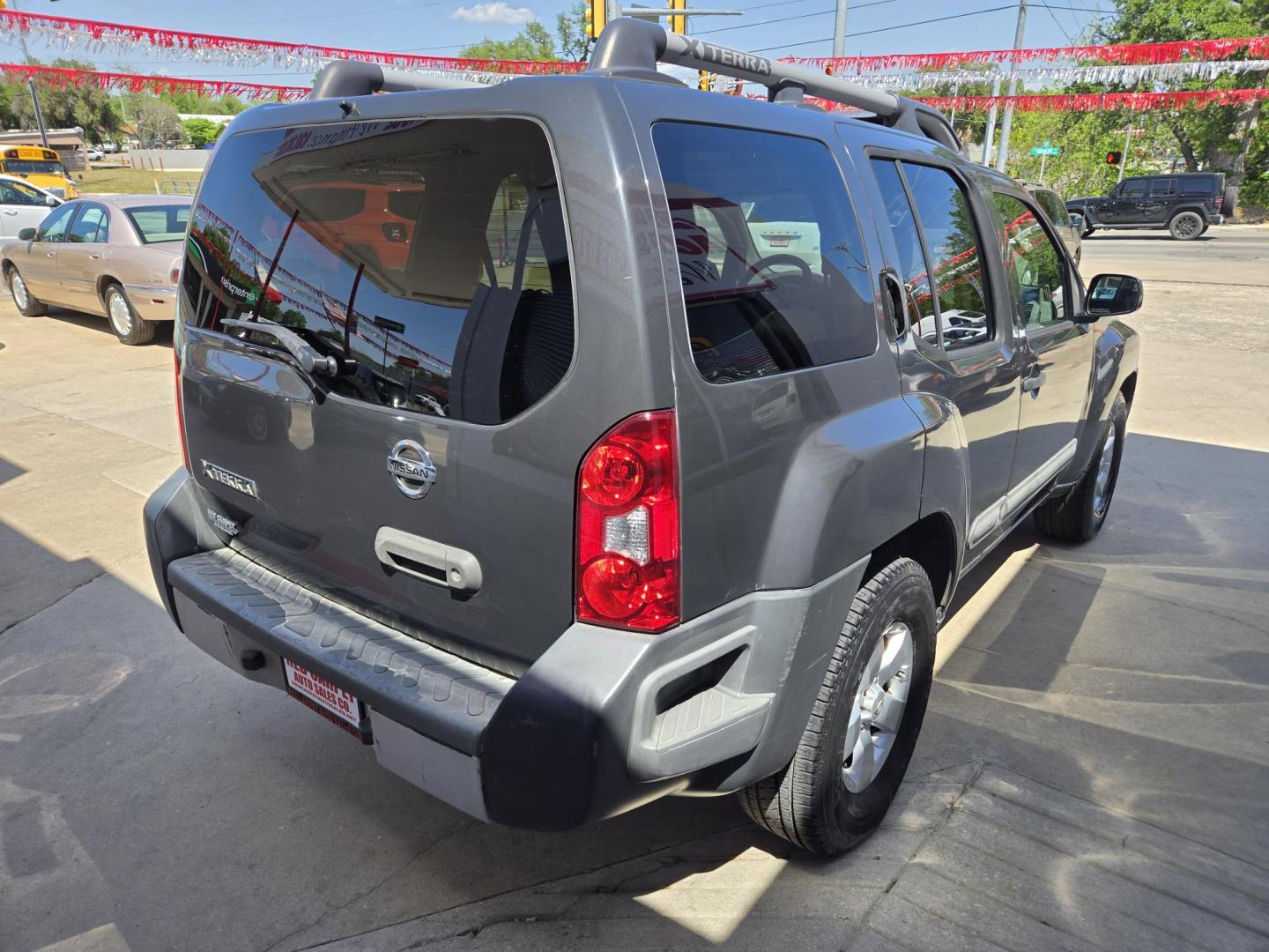2012 GRAY Nissan Xterra S 2WD (5N1AN0NU2CC) with an 4.0L V6 DOHC 24V engine, Automatic transmission, located at 503 West Court, Seguin, TX, 78155, (830) 379-3373, 29.568621, -97.969803 - 2012 Nissan Xterra S 2WD with a 4.0L V6 DOHC 24V, Automatic, Tilt, Cruise. AM/FM/Bluetooth Stereo, Power Windows, Locks and Side Mirrors, Tinted Windows, Alloy Wheels, Rear Wiper, Rear Defroster and more!! - Photo#2