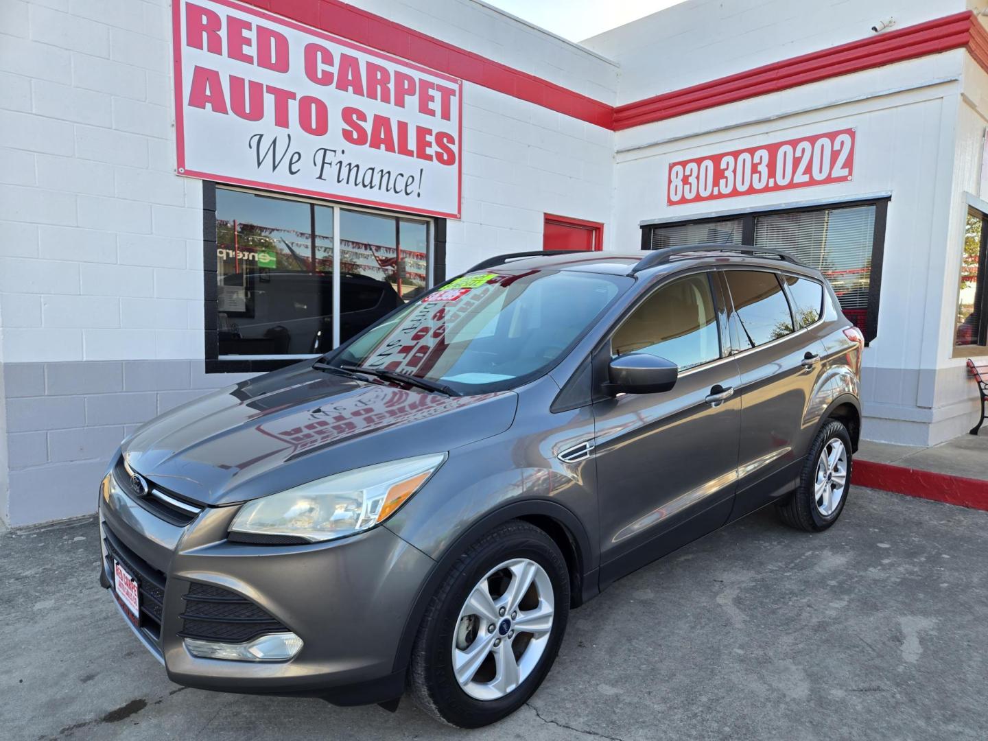 2014 GRAY Ford Escape SE FWD (1FMCU0GX2EU) with an 1.6L L4 DOHC 16V engine, 6-Speed Automatic transmission, located at 503 West Court, Seguin, TX, 78155, (830) 379-3373, 29.568621, -97.969803 - *Cash Special* 2014 Ford Escape SE FWD with a 1.6L L4 DOHC 16V, Automatic, Tilt, Cruise, AM/FM/CD Touchscreen Stereo, Power Windows, Locks, Seat and Side Mirrors, Bluetooth, Dual Climate Control, Rear A/C, Tinted Windows, Backup Camera, Bumper Sensors, Alloy Wheels, Rear Wiper, Rear Defroster and mo - Photo#0