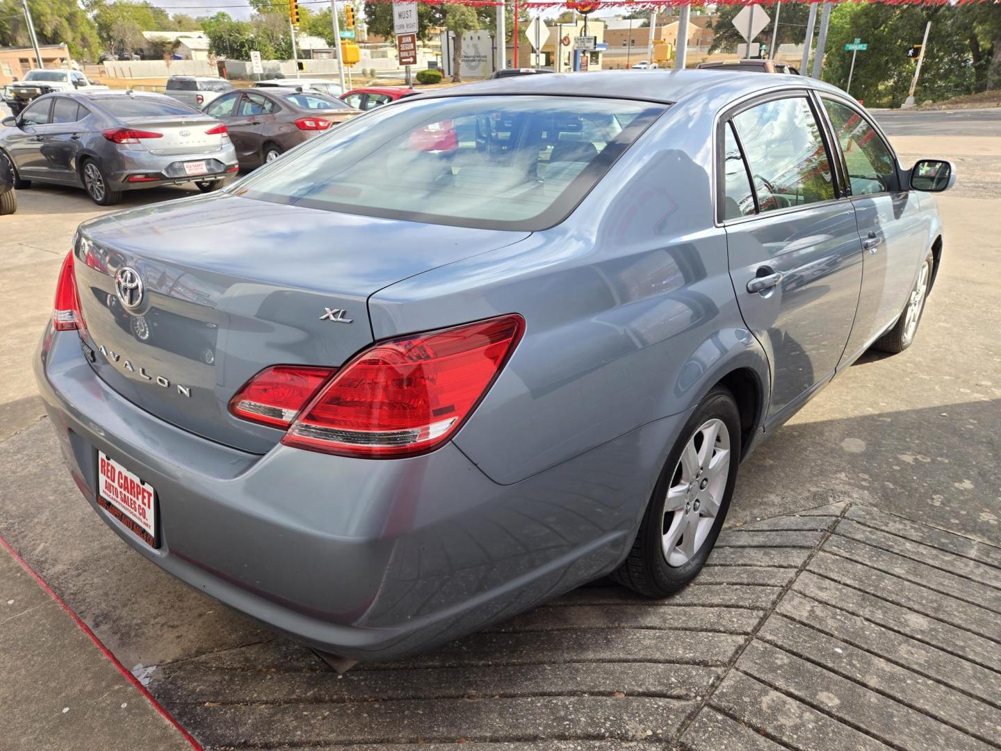 2006 Blue Toyota Avalon Limited (4T1BK36B46U) with an 3.5L V6 DOHC 24V engine, 5-Speed Automatic Overdrive transmission, located at 503 West Court, Seguin, TX, 78155, (830) 379-3373, 29.568621, -97.969803 - Photo#1