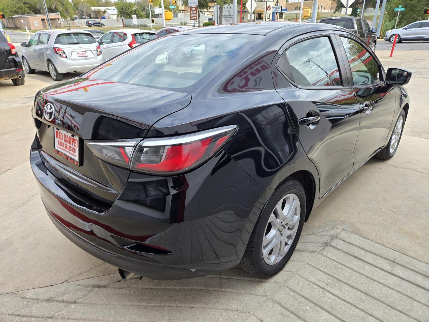 2018 Black Toyota Yaris iA 6A (3MYDLBYV8JY) with an 1.5L L4 DOHC 16V engine, Automatic transmission, located at 503 West Court, Seguin, TX, 78155, (830) 379-3373, 29.568621, -97.969803 - 2018 Toyota Yaris iA with a 1.5L L4 DOHC 16V, Automatic, Tilt, Cruise, AM/FM/AUX Stereo, Power Windows, Locks and Side Mirrors, Bluetooth, Backup Camera, Alloy Wheels, Rear Defroster and more!! - Photo#2