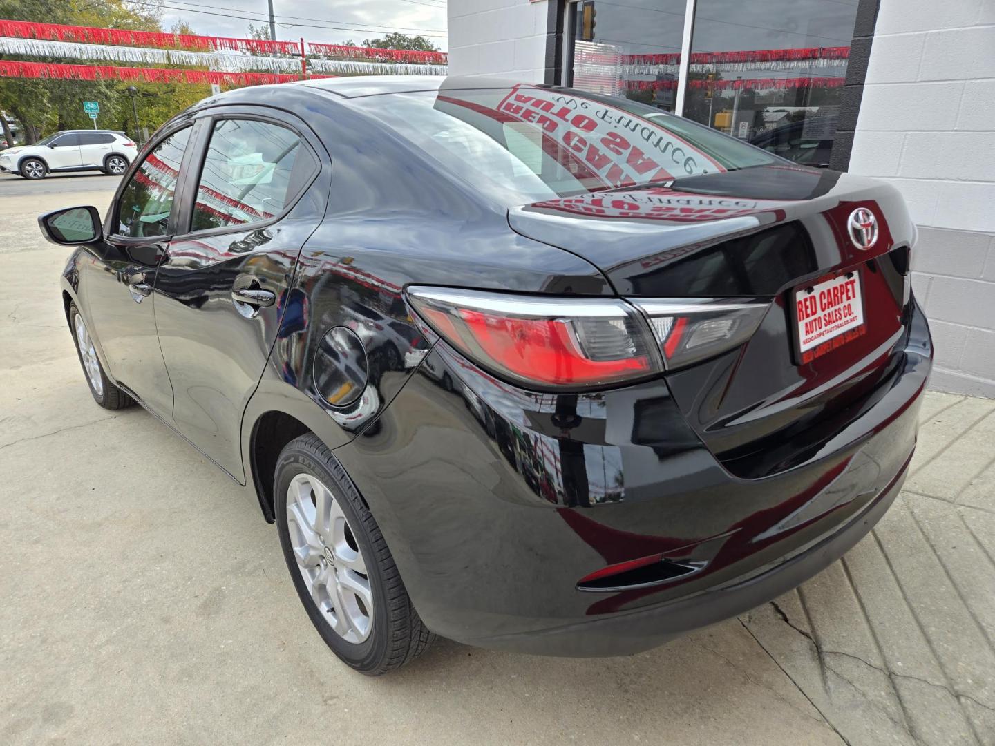 2018 Black Toyota Yaris iA 6A (3MYDLBYV8JY) with an 1.5L L4 DOHC 16V engine, Automatic transmission, located at 503 West Court, Seguin, TX, 78155, (830) 379-3373, 29.568621, -97.969803 - 2018 Toyota Yaris iA with a 1.5L L4 DOHC 16V, Automatic, Tilt, Cruise, AM/FM/AUX Stereo, Power Windows, Locks and Side Mirrors, Bluetooth, Backup Camera, Alloy Wheels, Rear Defroster and more!! - Photo#3