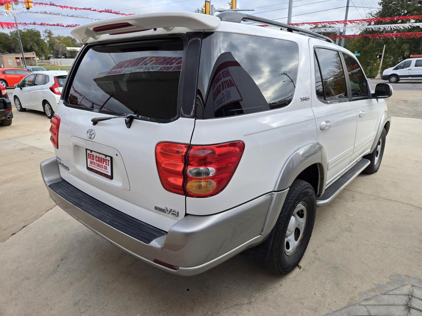 2003 WHITE Toyota Sequoia SR5 2WD (5TDZT34A73S) with an 4.7L V8 DOHC 32V engine, 4-Speed Automatic Overdrive transmission, located at 503 West Court, Seguin, TX, 78155, (830) 379-3373, 29.568621, -97.969803 - 2003 Toyota Sequoia SR5 2WD with a 4.7L V8 DOHC 32V, Automatic, Tilt, Cruise, AM/FM/CD/CASETTE Stereo, Power Windows, Locks and Seat, Rear A/C, Leather Seating, Running Boards, Alloy Wheels, Rear Wiper, Rear Defroster and more!! - Photo#2