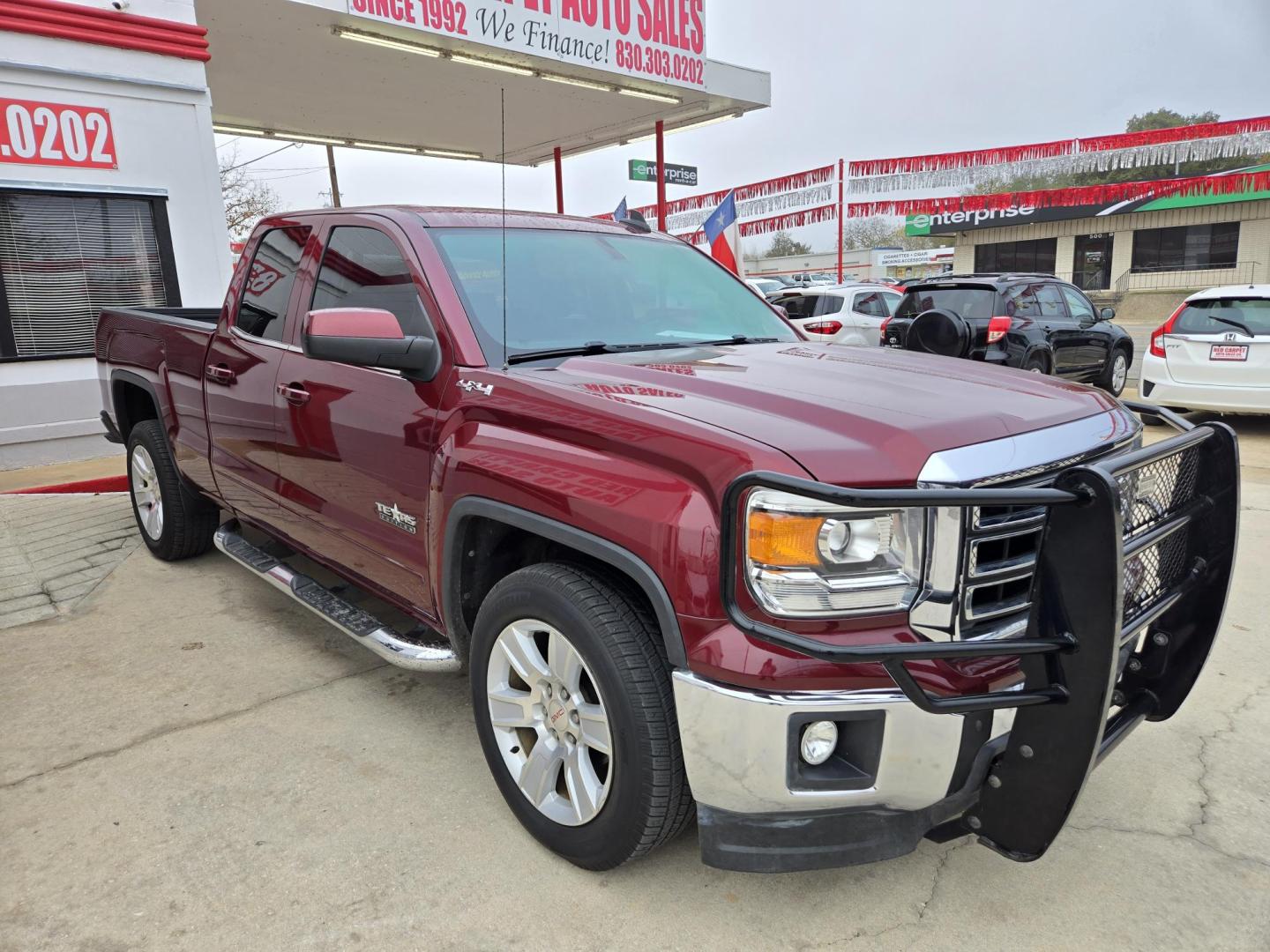 2015 Maroon /BLACK GMC Sierra 1500 SLE Double Cab 4WD (1GTV2UECXFZ) with an 5.3L V8 OHV 16V engine, 6-Speed Automatic transmission, located at 503 West Court, Seguin, TX, 78155, (830) 379-3373, 29.568621, -97.969803 - Photo#1