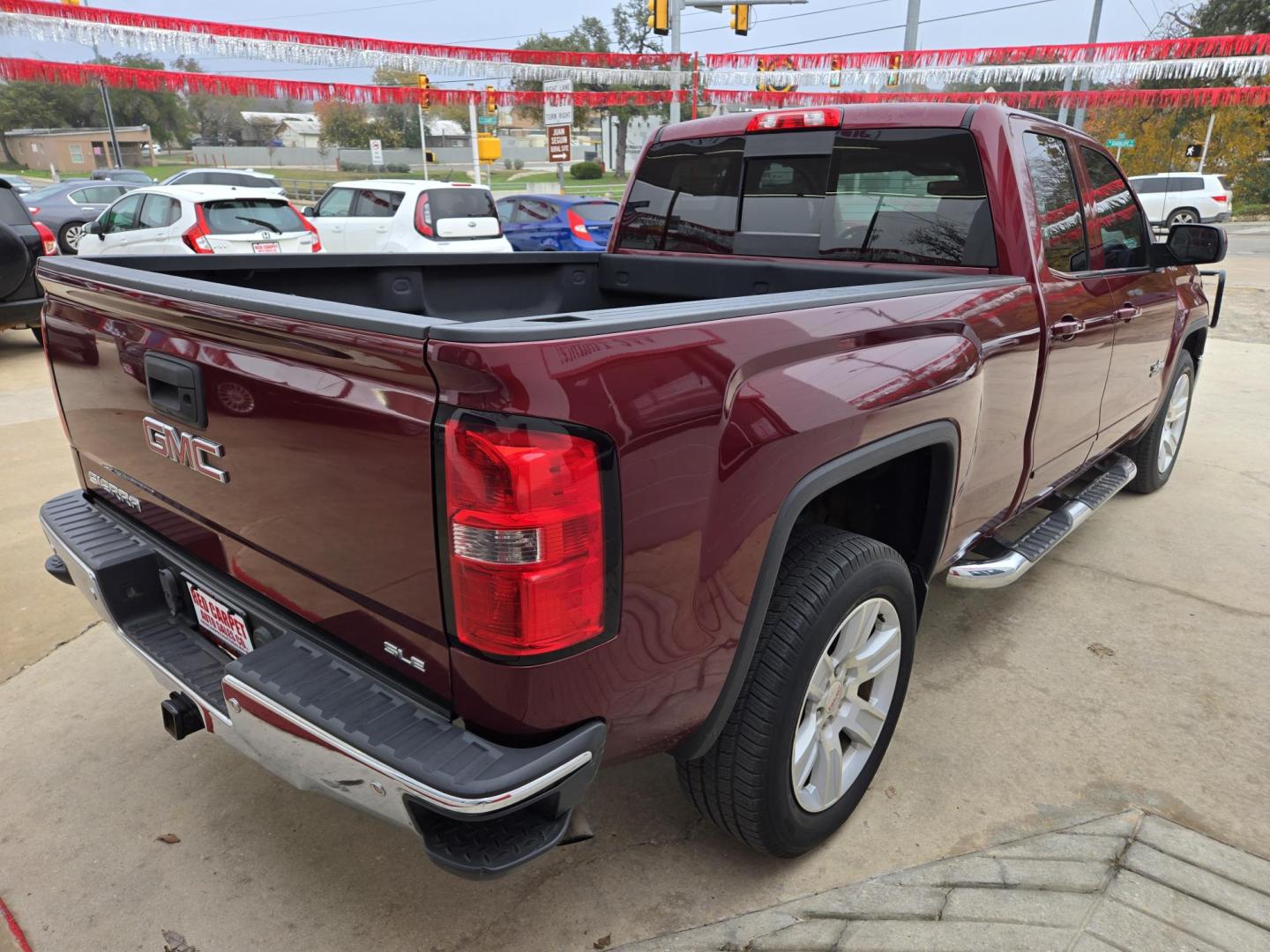 2015 Maroon /BLACK GMC Sierra 1500 SLE Double Cab 4WD (1GTV2UECXFZ) with an 5.3L V8 OHV 16V engine, 6-Speed Automatic transmission, located at 503 West Court, Seguin, TX, 78155, (830) 379-3373, 29.568621, -97.969803 - Photo#2