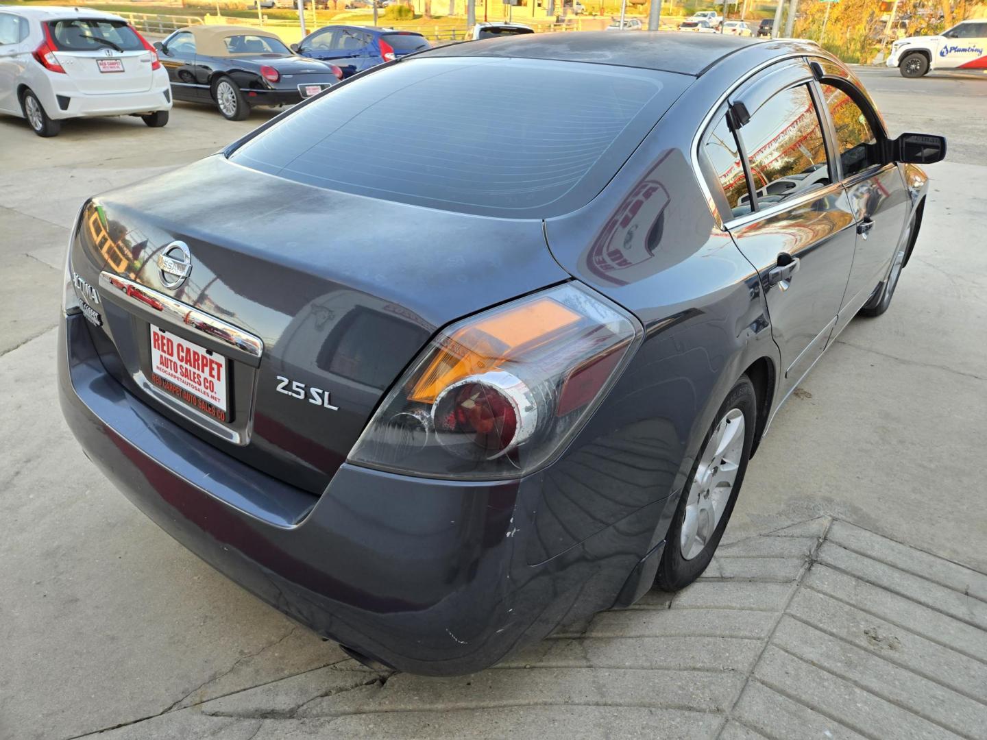 2009 Black Nissan Altima 2.5 (1N4AL21E09N) with an 2.5L L4 DOHC 16V engine, Automatic transmission, located at 503 West Court, Seguin, TX, 78155, (830) 379-3373, 29.568621, -97.969803 - 2009 Nissan Altima *Cash Special* with a 2.5L L4 DOHC 16V, Automatic, Tilt, Cruise, AM/FM/Bluetooth Touchscreen Radio, Power Windows, Locks, Seat and Side Mirrors, Leather Seating, Power Sunroof, Heated Seats, Alloy Wheels, Tinted Windows, Rear Defroster and more!! - Photo#1