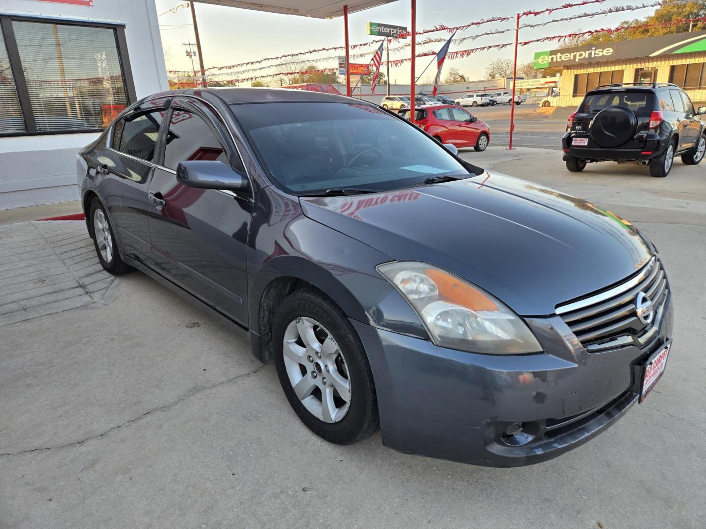 2009 Black Nissan Altima 2.5 (1N4AL21E09N) with an 2.5L L4 DOHC 16V engine, Automatic transmission, located at 503 West Court, Seguin, TX, 78155, (830) 379-3373, 29.568621, -97.969803 - 2009 Nissan Altima *Cash Special* with a 2.5L L4 DOHC 16V, Automatic, Tilt, Cruise, AM/FM/Bluetooth Touchscreen Radio, Power Windows, Locks, Seat and Side Mirrors, Leather Seating, Power Sunroof, Heated Seats, Alloy Wheels, Tinted Windows, Rear Defroster and more!! - Photo#2