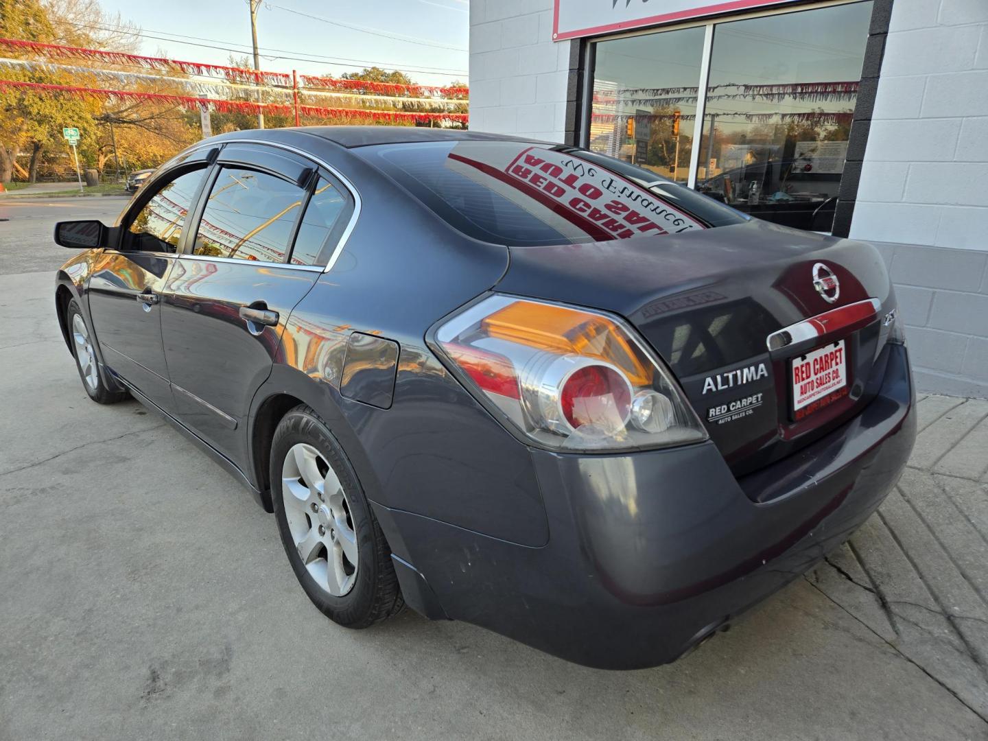 2009 Black Nissan Altima 2.5 (1N4AL21E09N) with an 2.5L L4 DOHC 16V engine, Automatic transmission, located at 503 West Court, Seguin, TX, 78155, (830) 379-3373, 29.568621, -97.969803 - 2009 Nissan Altima *Cash Special* with a 2.5L L4 DOHC 16V, Automatic, Tilt, Cruise, AM/FM/Bluetooth Touchscreen Radio, Power Windows, Locks, Seat and Side Mirrors, Leather Seating, Power Sunroof, Heated Seats, Alloy Wheels, Tinted Windows, Rear Defroster and more!! - Photo#4