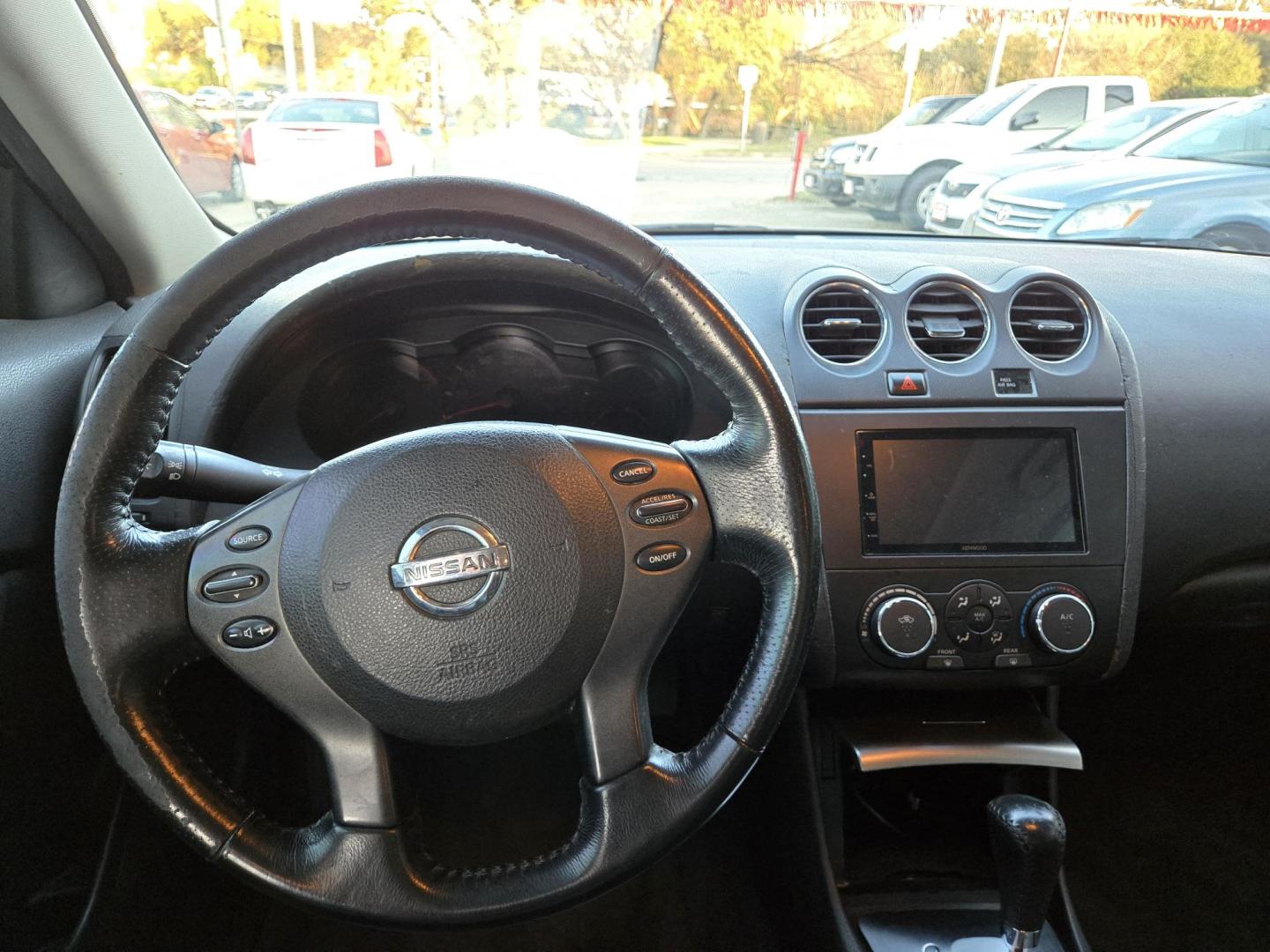 2009 Black Nissan Altima 2.5 (1N4AL21E09N) with an 2.5L L4 DOHC 16V engine, Automatic transmission, located at 503 West Court, Seguin, TX, 78155, (830) 379-3373, 29.568621, -97.969803 - 2009 Nissan Altima *Cash Special* with a 2.5L L4 DOHC 16V, Automatic, Tilt, Cruise, AM/FM/Bluetooth Touchscreen Radio, Power Windows, Locks, Seat and Side Mirrors, Leather Seating, Power Sunroof, Heated Seats, Alloy Wheels, Tinted Windows, Rear Defroster and more!! - Photo#5