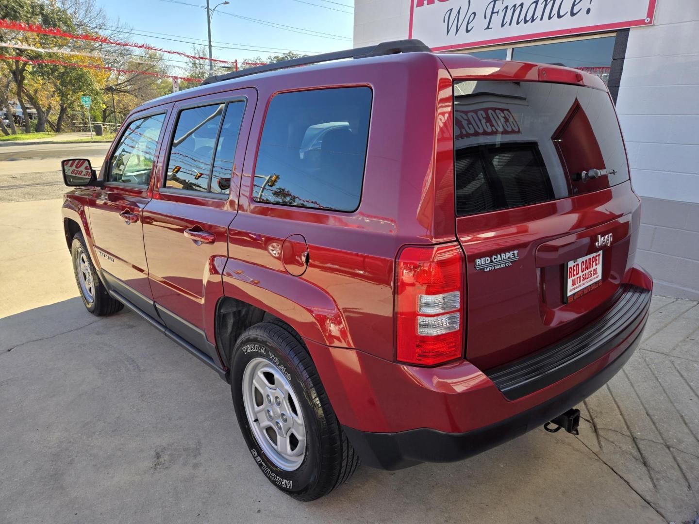 2015 Red Jeep Patriot Sport 2WD (1C4NJPBB7FD) with an 2.4L L4 DOHC 16V engine, Automatic transmission, located at 503 West Court, Seguin, TX, 78155, (830) 379-3373, 29.568621, -97.969803 - 2015 Jeep Patriot Sport 2WD with a 2.4L L4 DOHC 16V, Automatic, Tilt, Cruise, AM/FM Touchscreen Stereo, Power Windows, Locks and Side Mirrors, Tinted Windows, Alloy Wheels, Rear Wiper, Rear Defroster and more!! - Photo#3