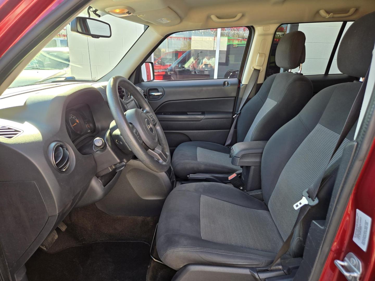 2015 Red Jeep Patriot Sport 2WD (1C4NJPBB7FD) with an 2.4L L4 DOHC 16V engine, Automatic transmission, located at 503 West Court, Seguin, TX, 78155, (830) 379-3373, 29.568621, -97.969803 - 2015 Jeep Patriot Sport 2WD with a 2.4L L4 DOHC 16V, Automatic, Tilt, Cruise, AM/FM Touchscreen Stereo, Power Windows, Locks and Side Mirrors, Tinted Windows, Alloy Wheels, Rear Wiper, Rear Defroster and more!! - Photo#4