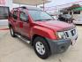 2013 Red Nissan Xterra X 4WD (5N1AN0NW7DN) with an 4.0L V6 DOHC 24V engine, 5-Speed Automatic transmission, located at 503 West Court, Seguin, TX, 78155, (830) 379-3373, 29.568621, -97.969803 - Photo#1