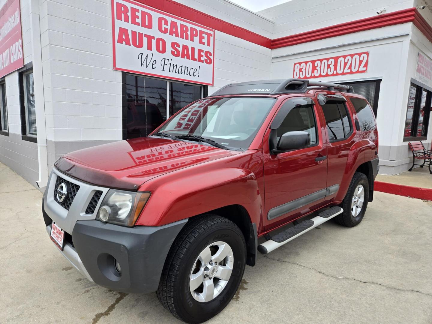 2013 Red Nissan Xterra X 4WD (5N1AN0NW7DN) with an 4.0L V6 DOHC 24V engine, 5-Speed Automatic transmission, located at 503 West Court, Seguin, TX, 78155, (830) 379-3373, 29.568621, -97.969803 - Photo#0