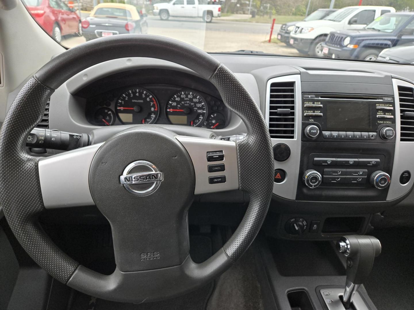 2013 Red Nissan Xterra X 4WD (5N1AN0NW7DN) with an 4.0L V6 DOHC 24V engine, 5-Speed Automatic transmission, located at 503 West Court, Seguin, TX, 78155, (830) 379-3373, 29.568621, -97.969803 - Photo#5