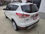 2014 WHITE Ford Escape Titanium FWD (1FMCU0JX4EU) with an 1.6L L4 DOHC 16V engine, 6-Speed Automatic transmission, located at 503 West Court, Seguin, TX, 78155, (830) 379-3373, 29.568621, -97.969803 - 2014 Ford Escape Titanium FWD with a 1.6L L4 DOHC 16V, Automatic, Tilt, Cruise, AM/FM/CD Touchscreen Stereo, Power Windows, Locks, Seats and Side Mirrors, Leather Seating, Dual Climate Control, Rear A/C, Heated Seats, Power Sunroof, Backup Camera, Bumper Sensors, Alloy Wheels, Rear Wiper, Rear Defro - Photo#2