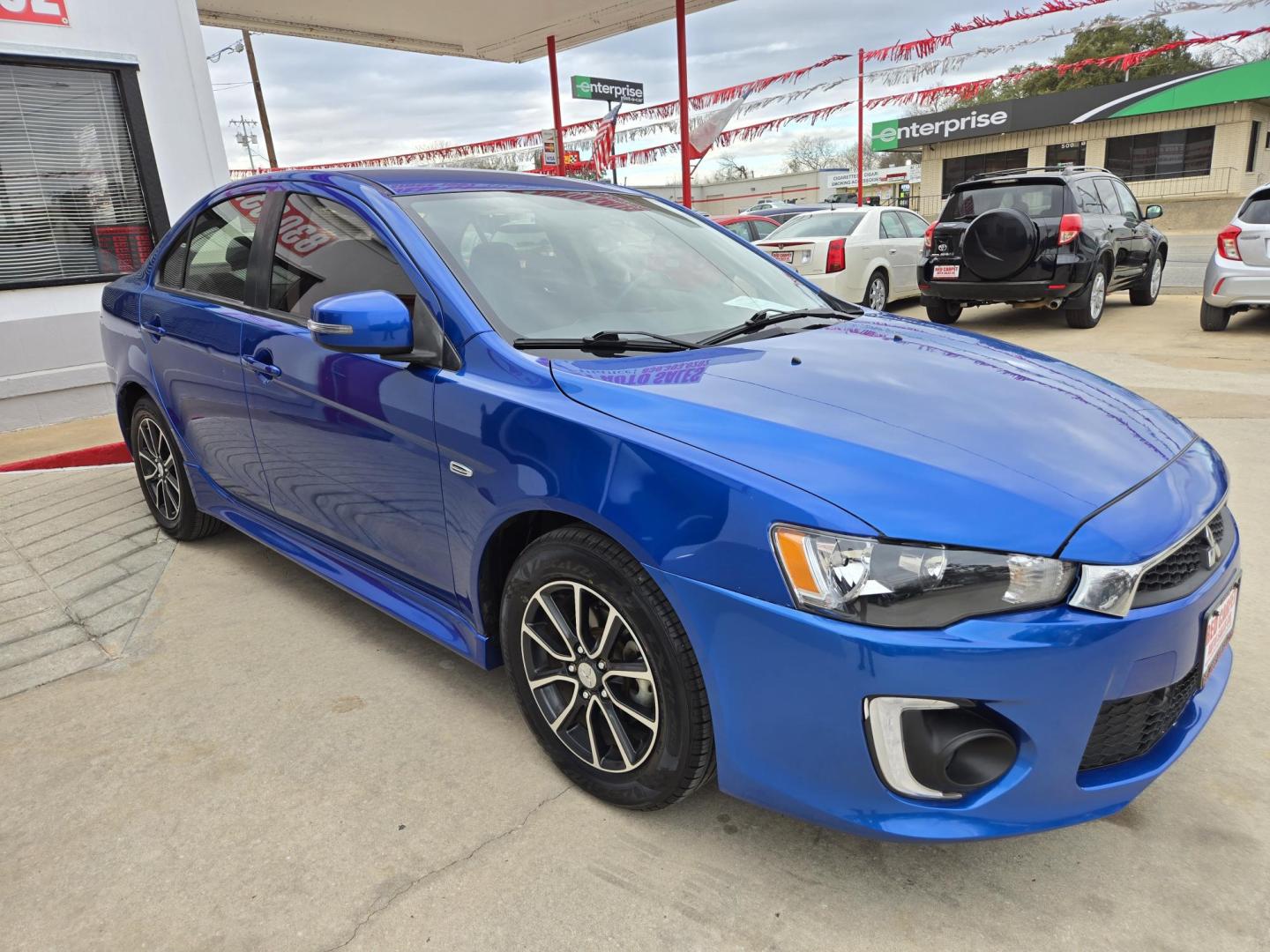 2017 Blue Mitsubishi Lancer ES 5M (JA32U2FU0HU) with an 2.0L L4 SOHC 16V engine, Automatic transmission, located at 503 West Court, Seguin, TX, 78155, (830) 379-3373, 29.568621, -97.969803 - 2017 Mitsubishi Lancer ES with a 2.0L L4 SOHC 16V, Automatic, Tilt, Cruise, AM/FM/CD/AUX Touchscreen Stereo, Power Windows, Locks and Side Mirrors, Bluetooth, Tinted Windows, Alloy Wheels, Backup Camera, Rear Defroster and more!! - Photo#1