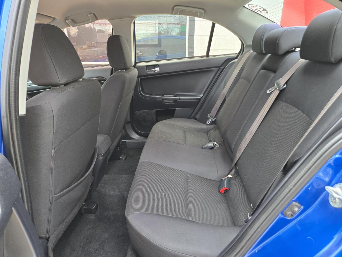 2017 Blue Mitsubishi Lancer ES 5M (JA32U2FU0HU) with an 2.0L L4 SOHC 16V engine, Automatic transmission, located at 503 West Court, Seguin, TX, 78155, (830) 379-3373, 29.568621, -97.969803 - 2017 Mitsubishi Lancer ES with a 2.0L L4 SOHC 16V, Automatic, Tilt, Cruise, AM/FM/CD/AUX Touchscreen Stereo, Power Windows, Locks and Side Mirrors, Bluetooth, Tinted Windows, Alloy Wheels, Backup Camera, Rear Defroster and more!! - Photo#6