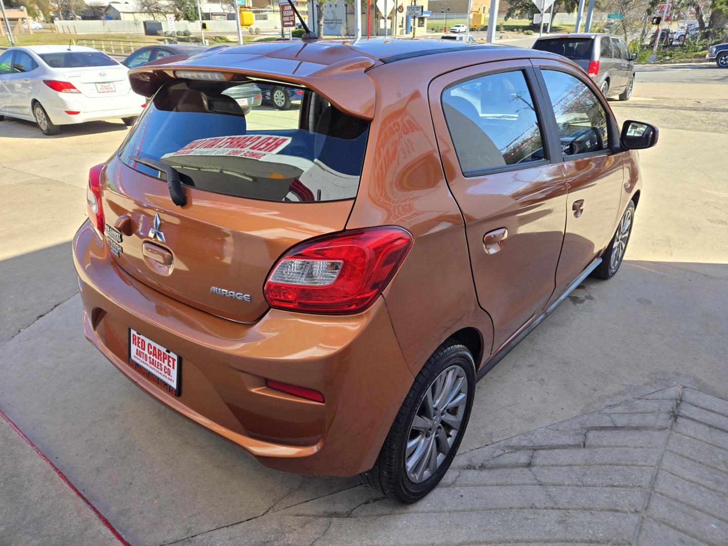 2019 Orange Mitsubishi Mirage GT (ML32A5HJ7KH) with an 1.2L L3 DOHC engine, CVT transmission, located at 503 West Court, Seguin, TX, 78155, (830) 379-3373, 29.568621, -97.969803 - Photo#2